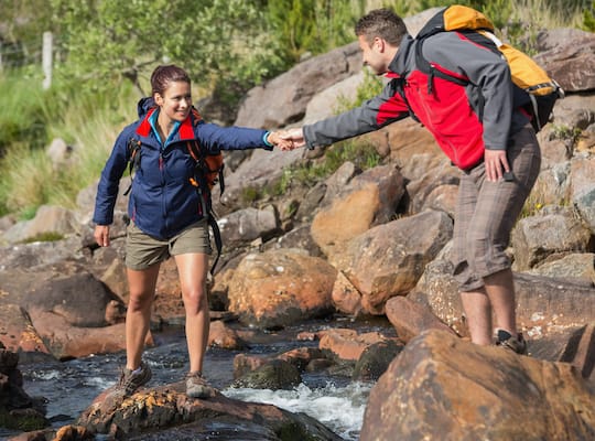 students hiking with outdoor recreation program