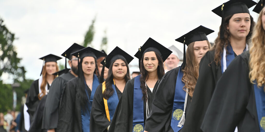 graduates lined up at commencement